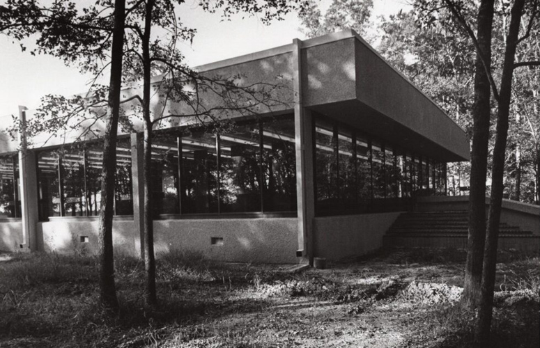 Photograph of the exterior of the Clear Lake Graduate Center facility of the University of Houston sometime in the mid-1970s. This building would be renamed the Arbor Building in 1974 when it became part of the new University of Houston at Clear Lake City.